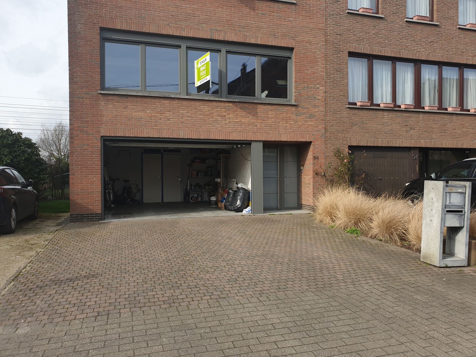 Woonhuis met 2 appartementen, tuin en garage foto 2