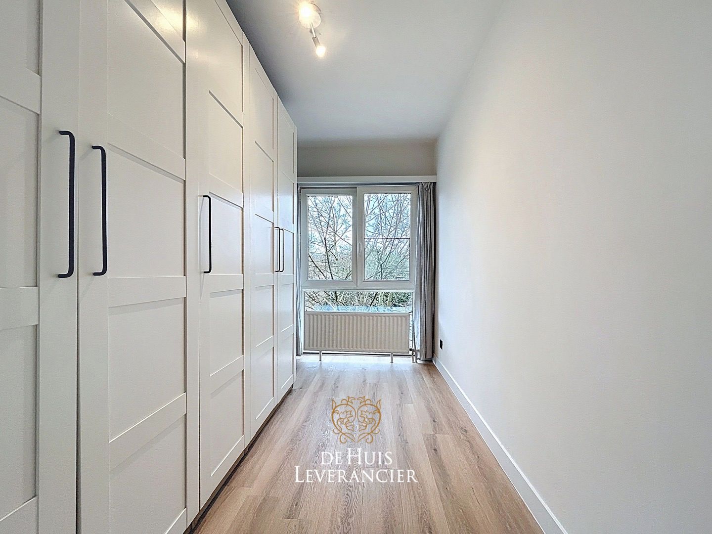 Gerenoveerd appartement met 2 slaapkamers, garagebox en berging te koop in Edegem foto 22