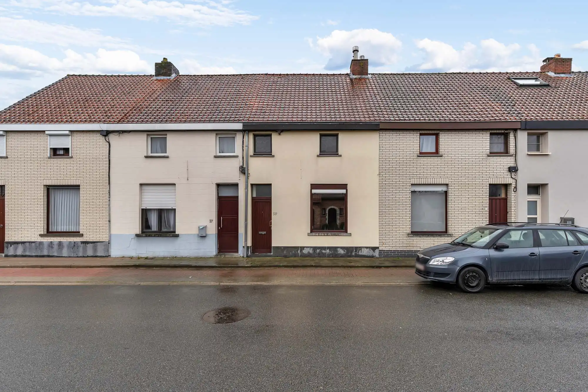 Gezellige rijwoning met tuin en achteruitweg foto {{pictureIndex}}