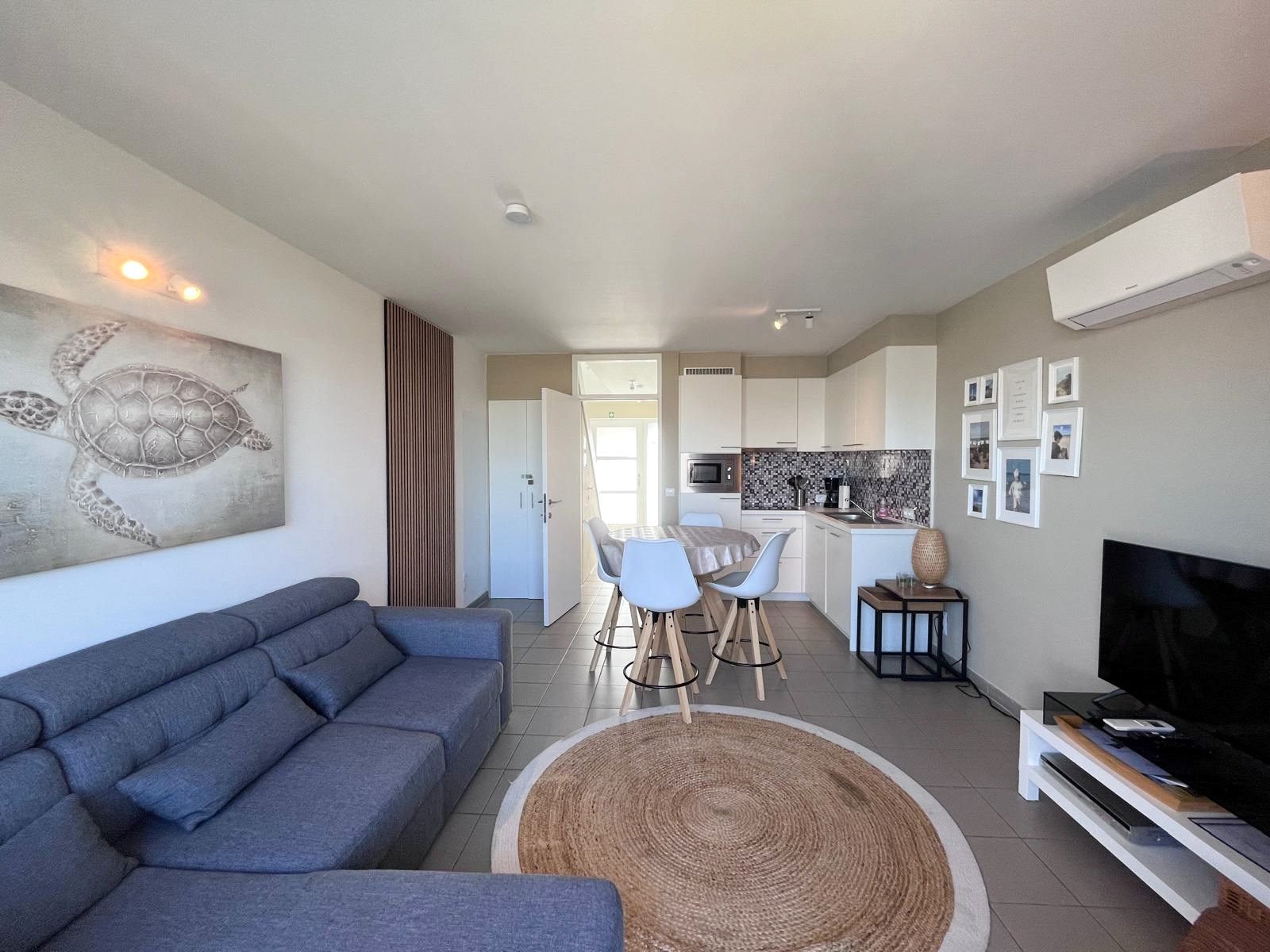 Vakantiewoning met zuid gerichte tuin op wandelafstand van de beschermde duinen  foto 2