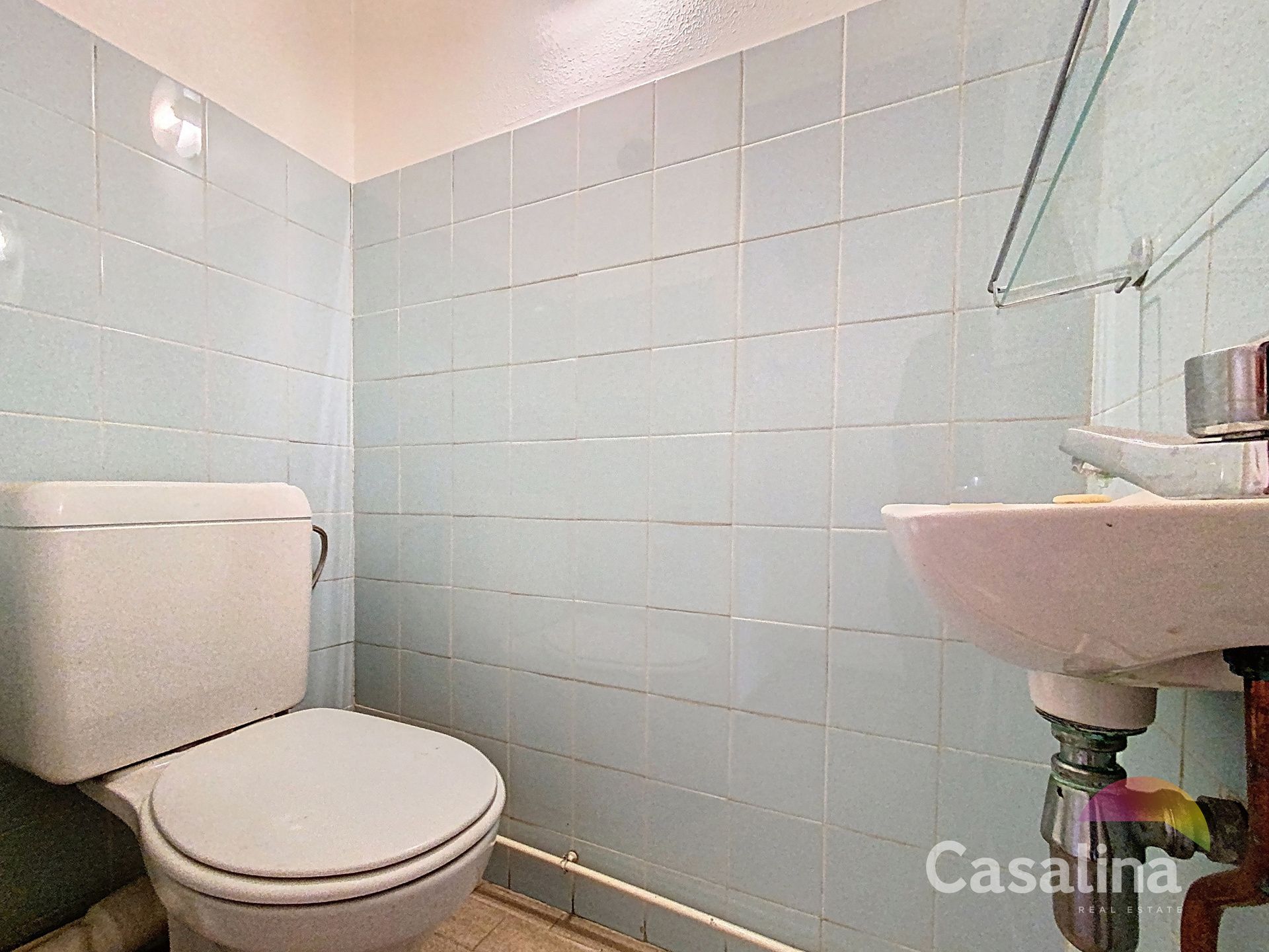Een gelijkvloerse kantoor, te renoveren van ± 34 m² foto 8
