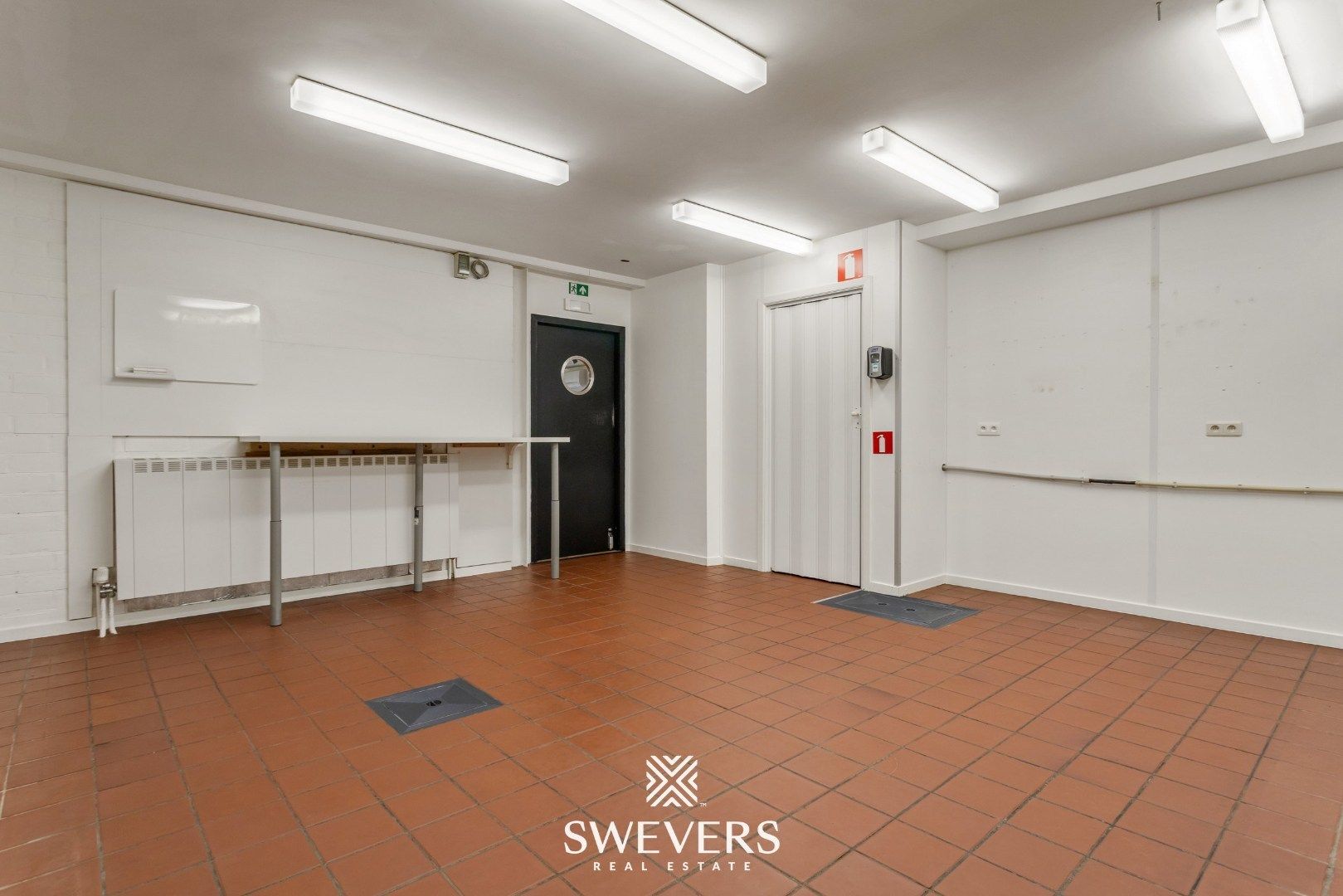 Unieke woon- en handelscombinatie te Lummen centrum foto 10