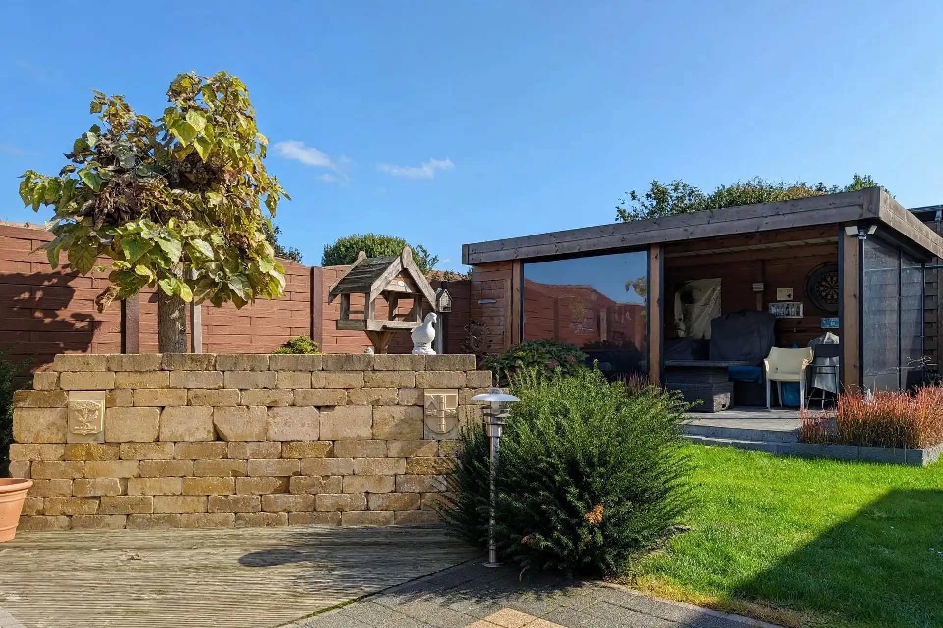 Instapklare gezinswoning met 3 slaapkamers en gezellige tuin foto 28
