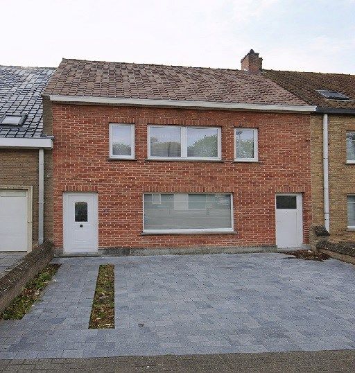 Verzorgde rijwoning  foto {{pictureIndex}}