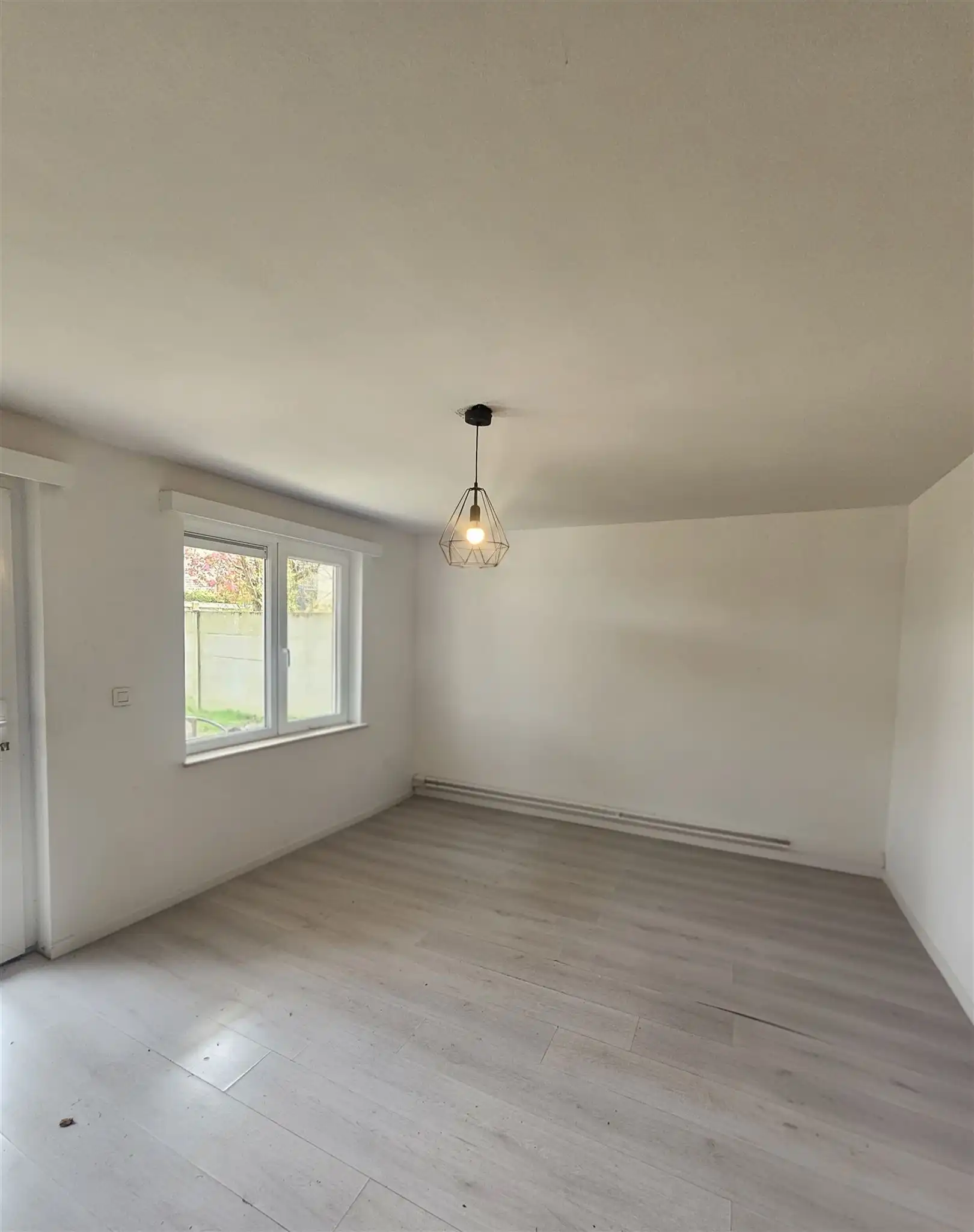 Ruim appartement met 2slps, tuin en garage. foto 7