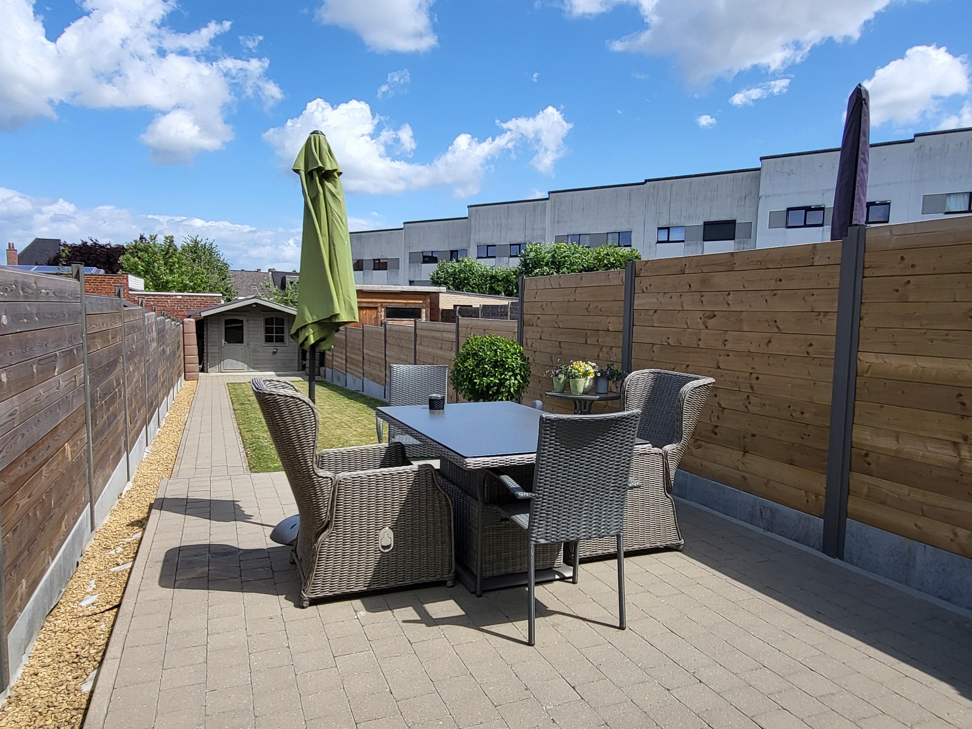 Prachtig onderhouden woning met zonnig tuintje en terras. foto 25