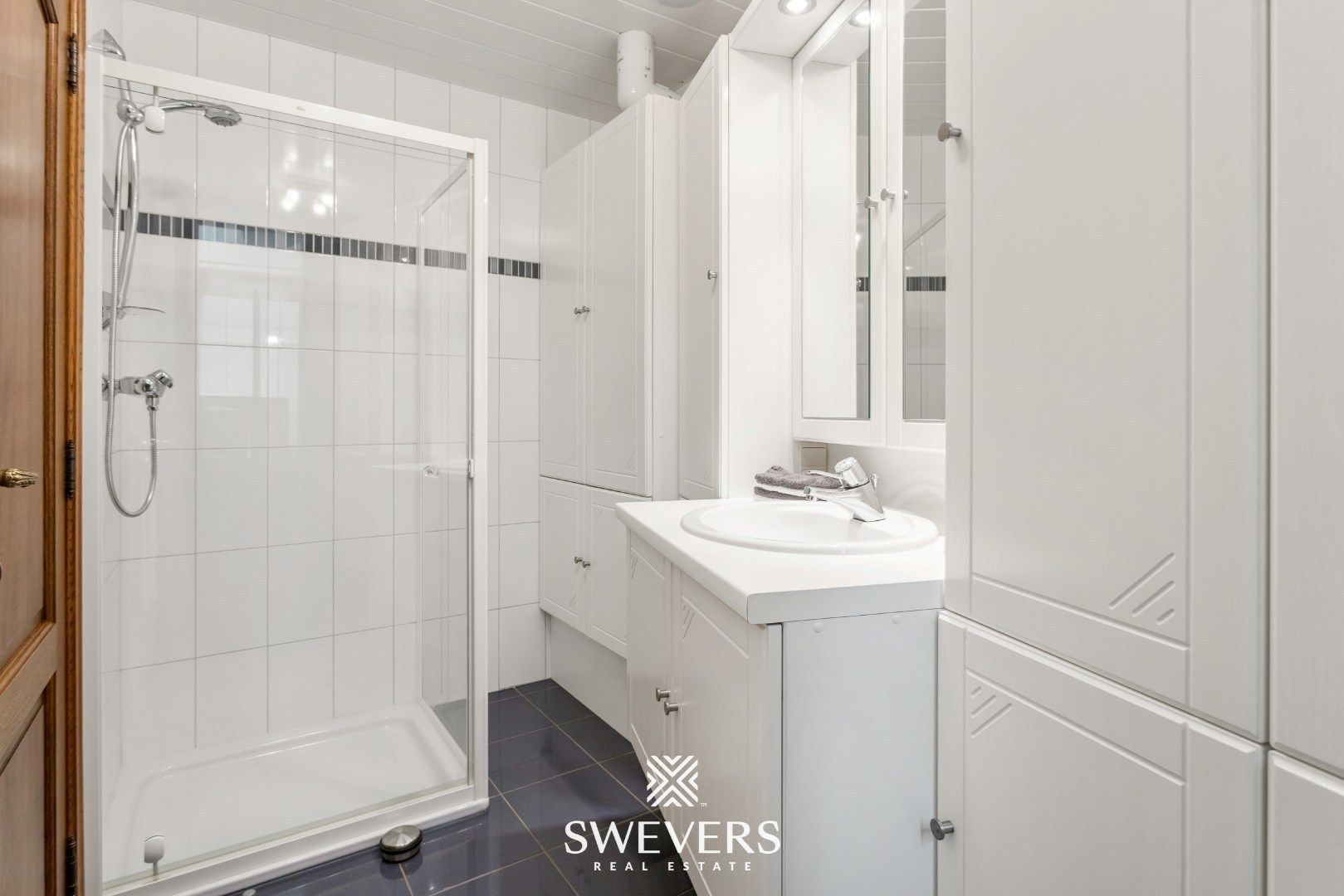 Ruim duplexappartement met grote veranda, riant terras, tuin en garage in hartje Lummen foto 13