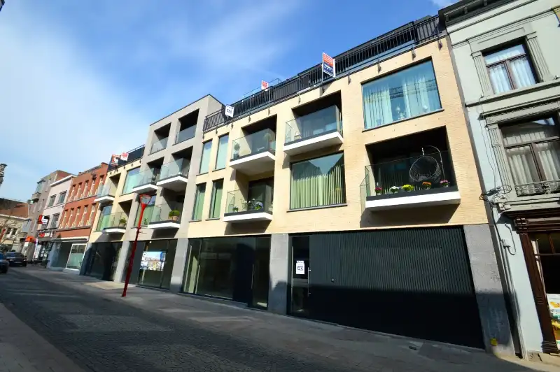 Nieuwbouwresidentie Clédor gelegen op 50m van de markt van Ronse foto {{pictureIndex}}