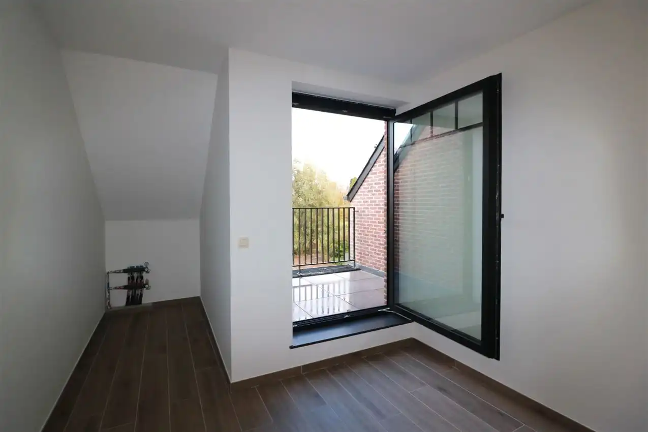 Unieke duplex met twee slpk, terras, autostaanplaats foto 19