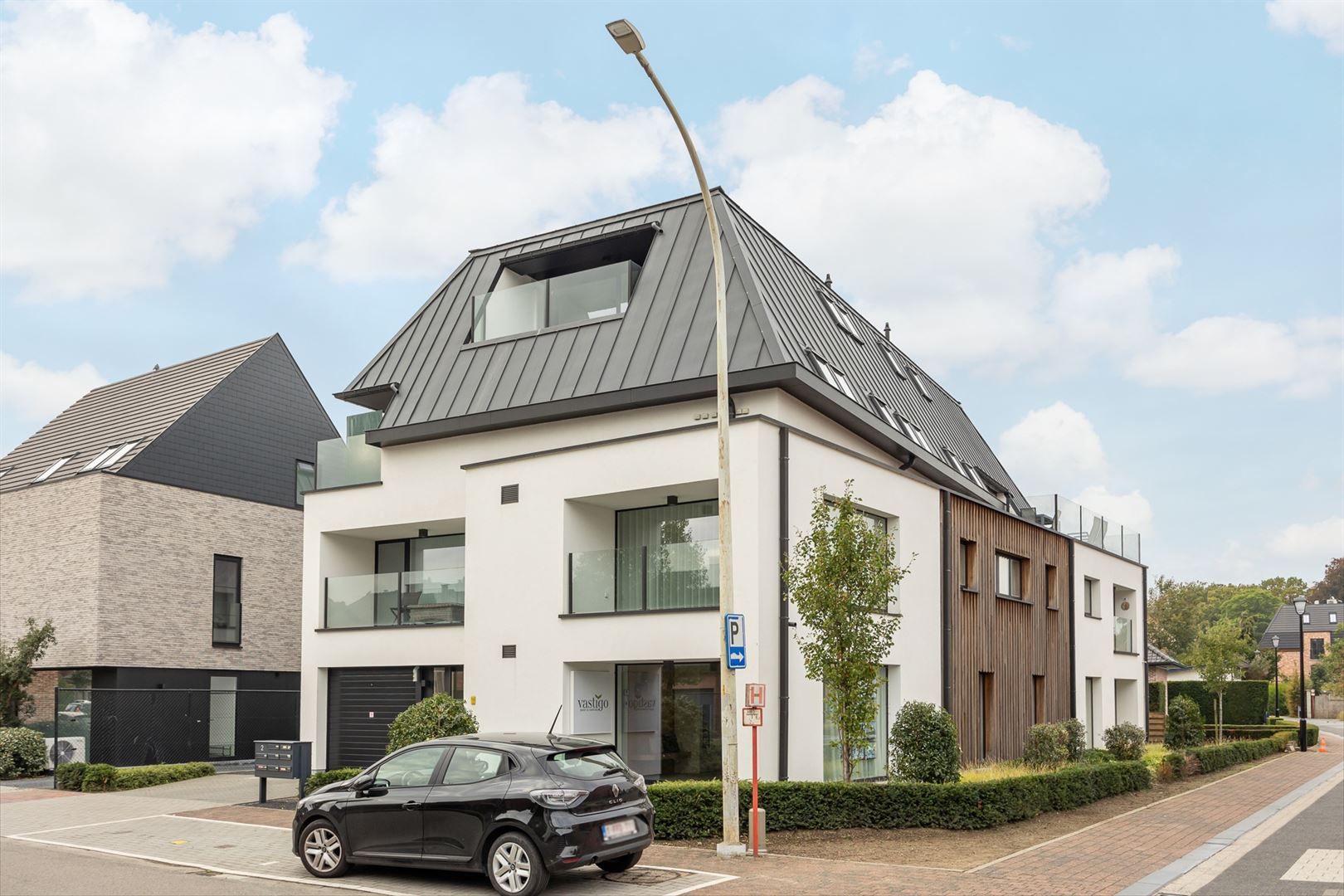Lichtrijk gelijkvloersappartement met zuid tuin en garage. foto 18