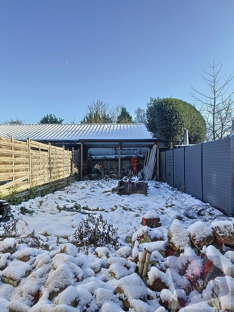 Unieke renovatiekans: Stijlvolle rijwoning met goedgekeurde plannen in Hasselt foto 10