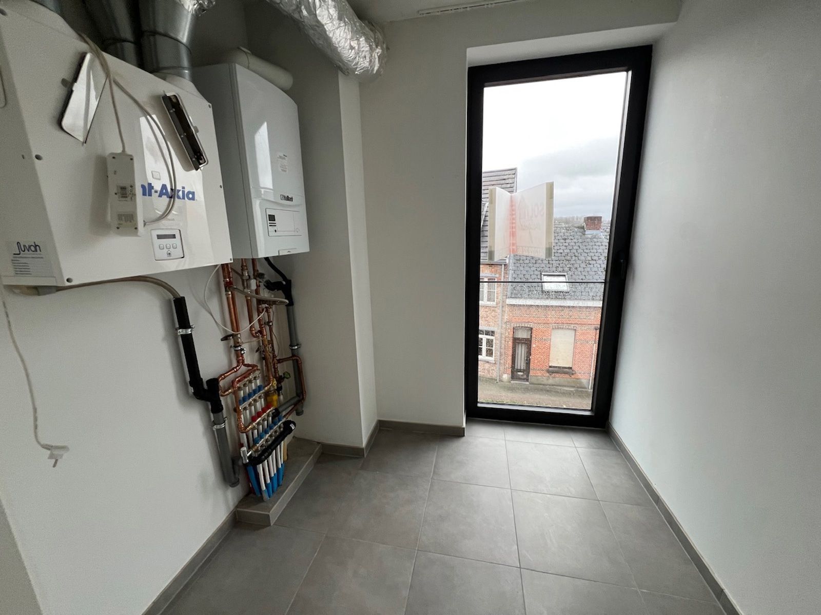 Recent dakapp met 2slpk, terras en parking foto 13