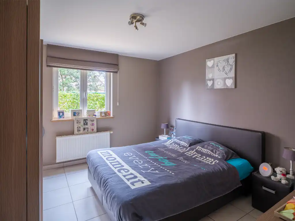 Gentbrugge - Licht op te frissen gelijkvloers appartement met 2 slaapkamers en tuin foto 9