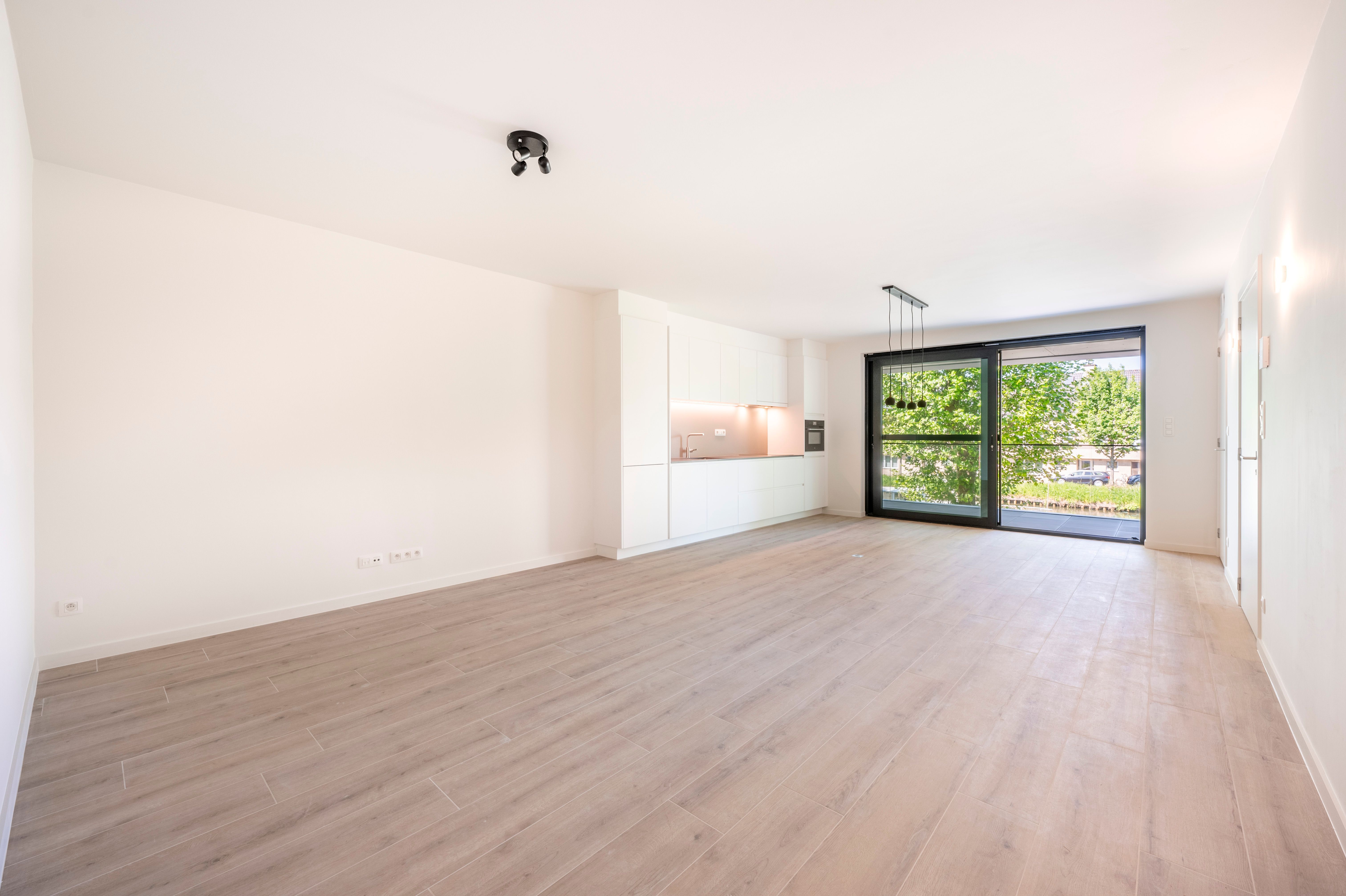 Stijlvol nieuwbouwappartement met uniek zicht op de Vaart van Schoten. foto 5