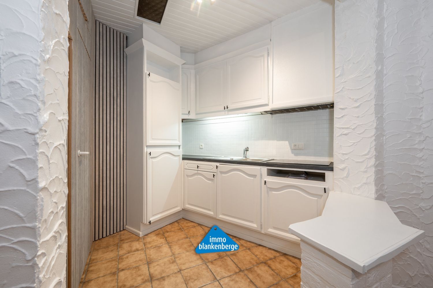 Volledig gerenoveerde rijwoning met één slaapkamer foto 5