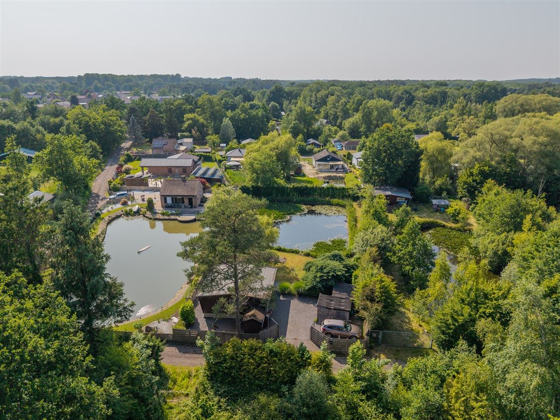 Knusse chalet op 15 are in bosrijk Herselt met vijver, terras en carport. Ideaal vakantieverblijf in het groen. foto 21