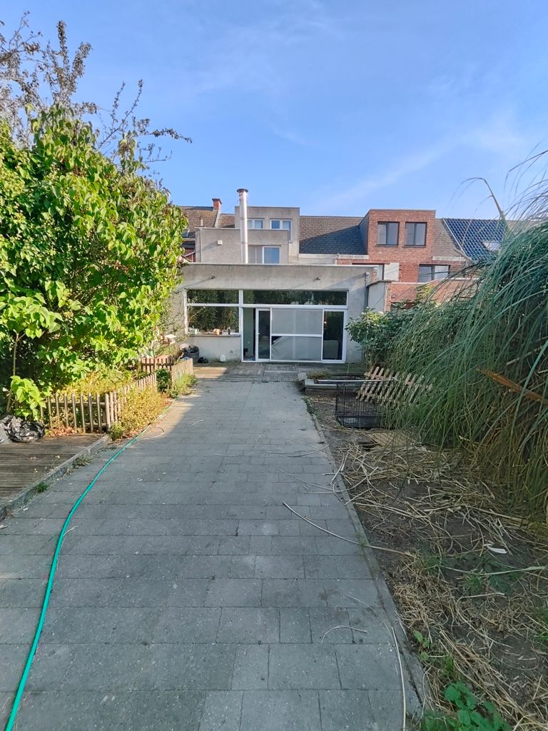 Duplex appartement met tuin foto 11