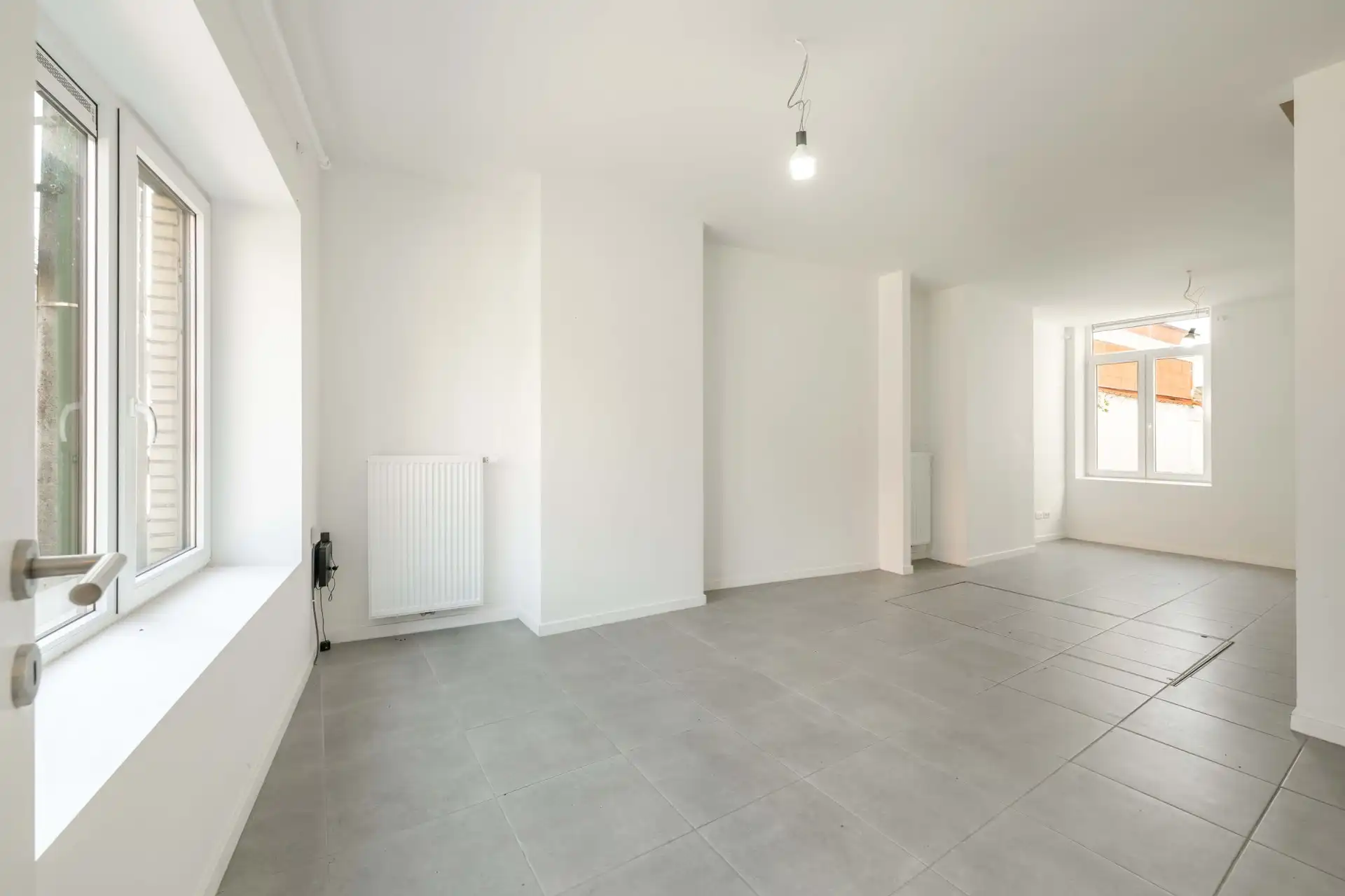 Volledig gerenoveerde rijwoning met 3 slaapkamers, 2 badkamers & gezellige binnenkoer in Wevelgem foto 3