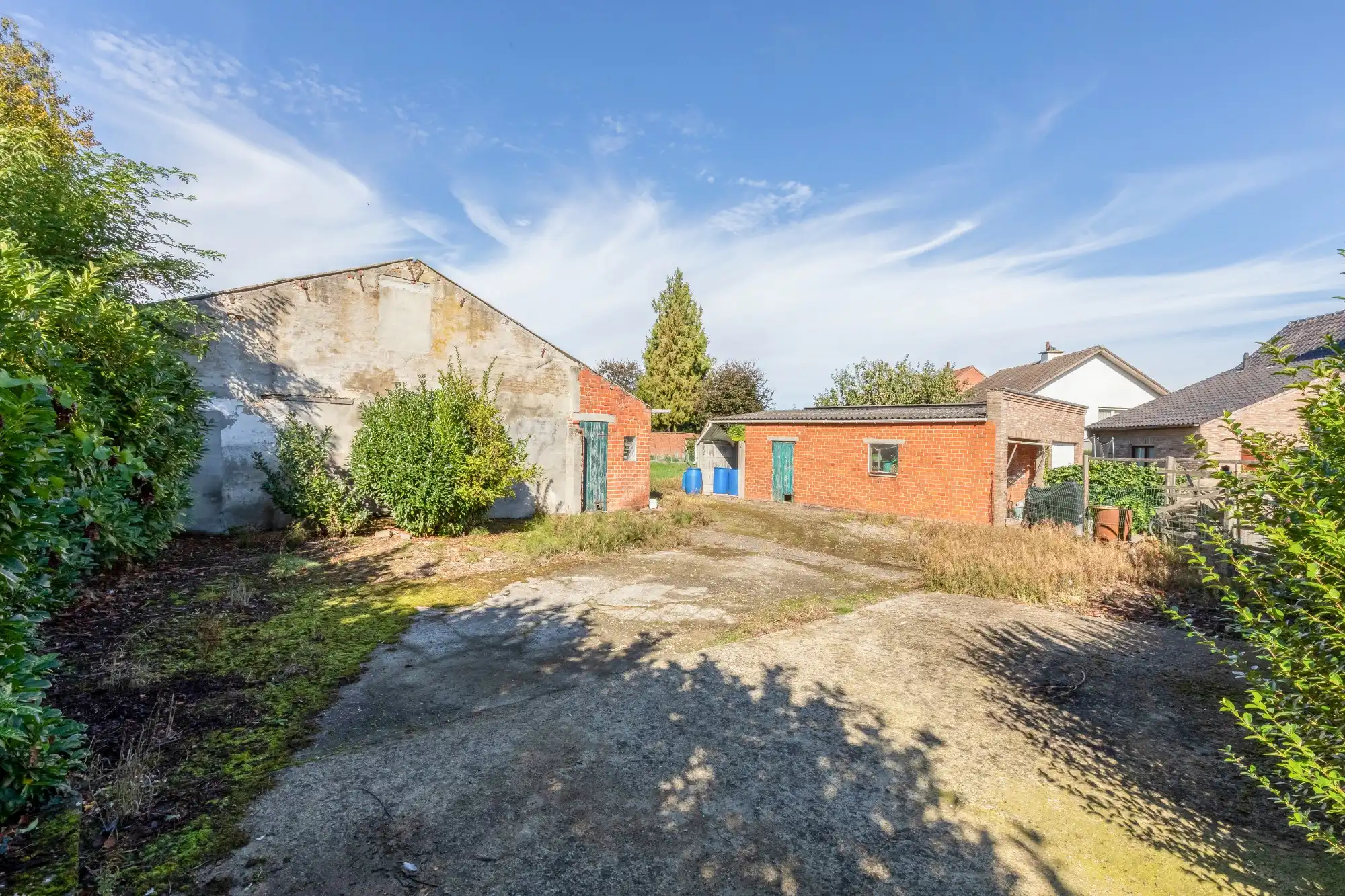 Voormalige hofstede met stallingen op perceel van 3016 m² dicht bij het centrum van Sint-Niklaas foto 9