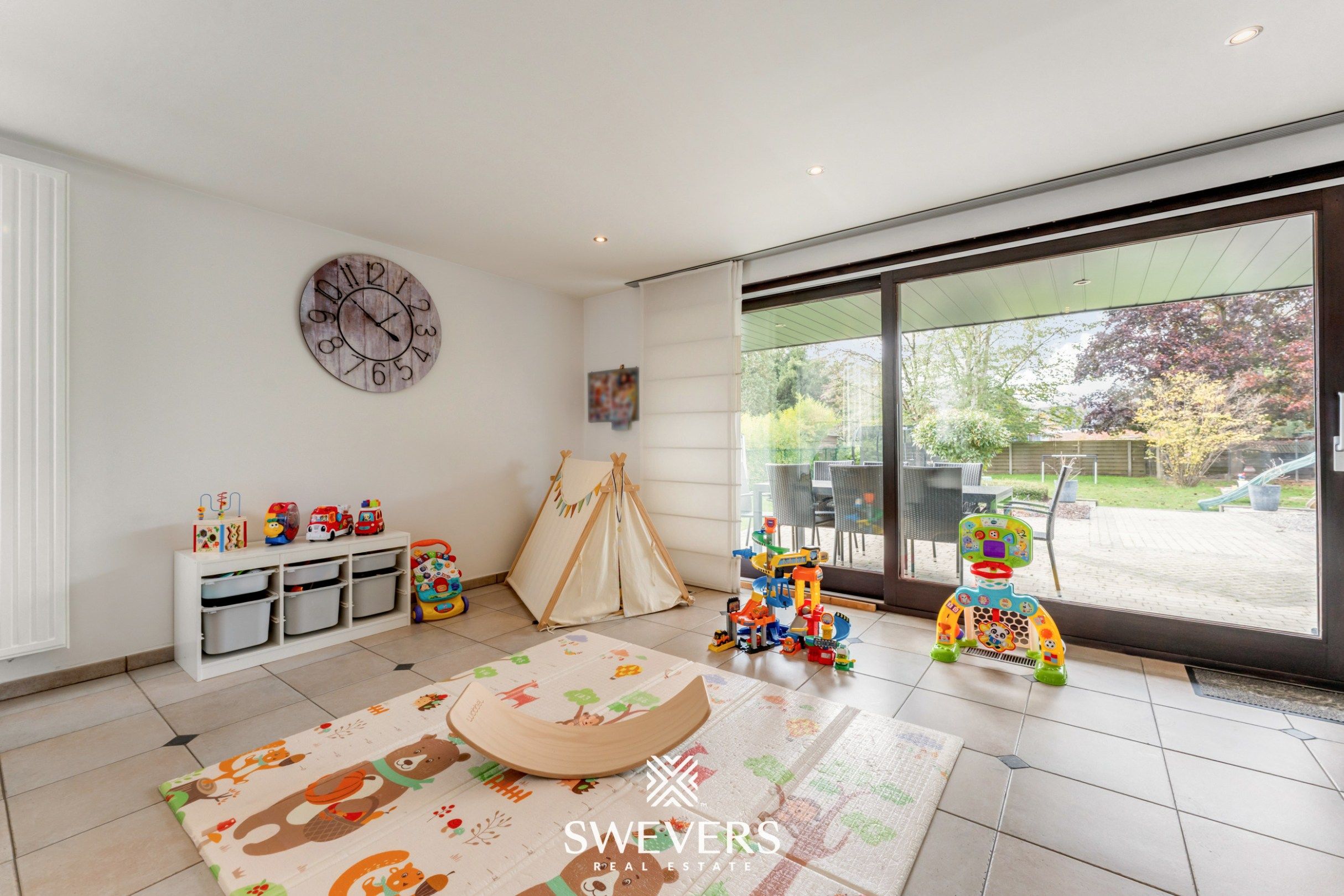 Knusse, hedendaagse gezinswoning met warme indeling en grote, zonnige tuin foto 7