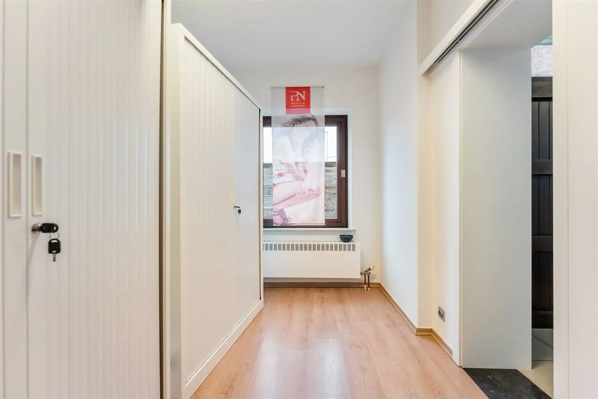 HANDELSPAND MET GOEDE VISIBILITEIT EN RUIME PARKING MET BOVENLIGGEND APPARTEMENT IN HEUSDEN-ZOLDER foto 7