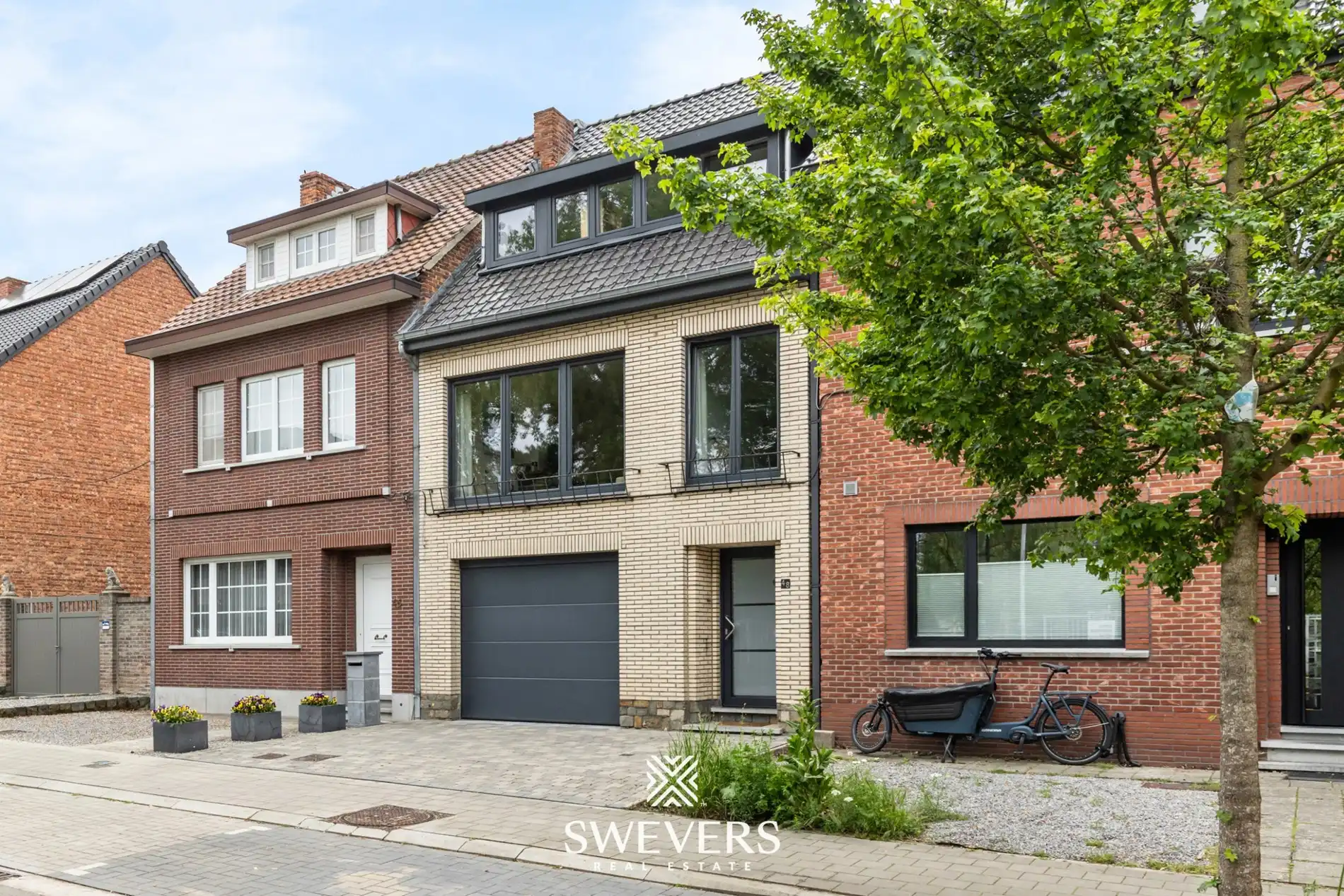 Instapklare rijwoning met 2 zeer ruime slaapkamers en uitstekende ligging foto 23