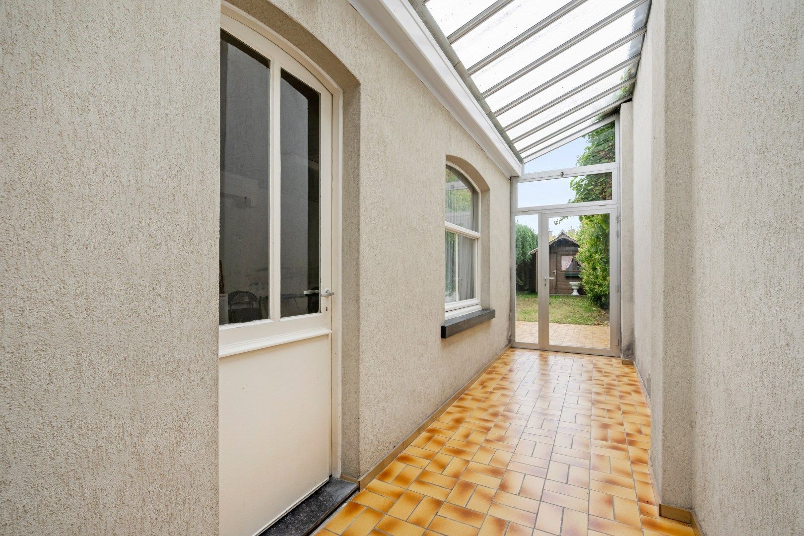 Woning met 3, mogelijks 5 slaapkamers en tuin met uitweg in Kortrijk-centrum foto 6