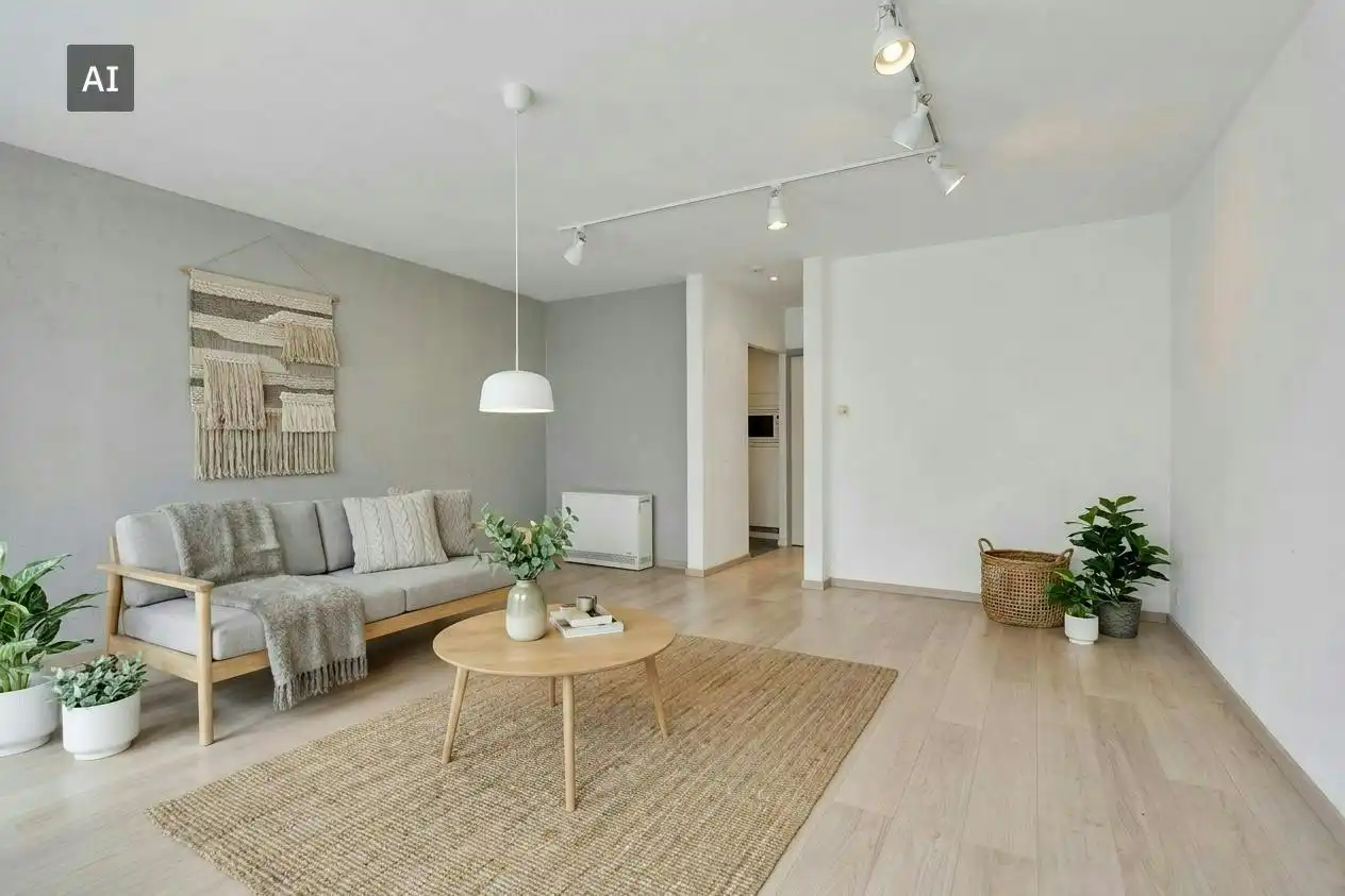 Instapklaar gelijkvloers appartement met gemeenschappelijke tuin en fietsenberging in hartje Kapellen! foto 3