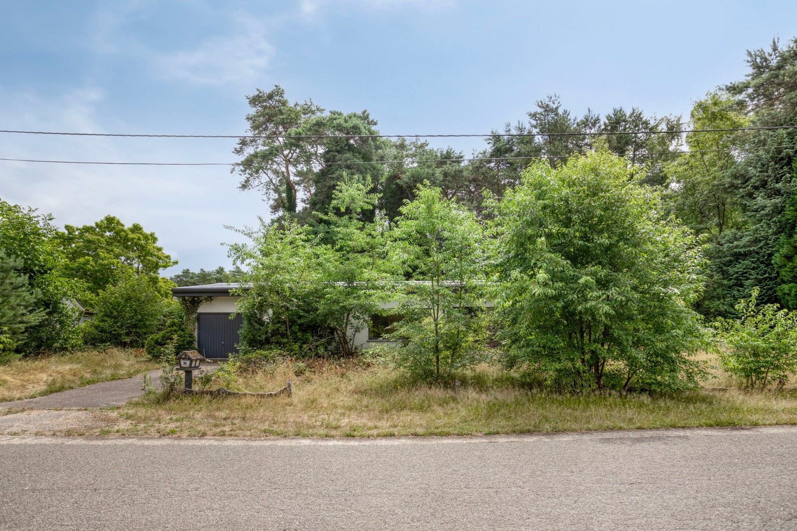 Te renoveren / te slopen woning op een uniek gelegen perceel van 1.693 m² ! foto 16