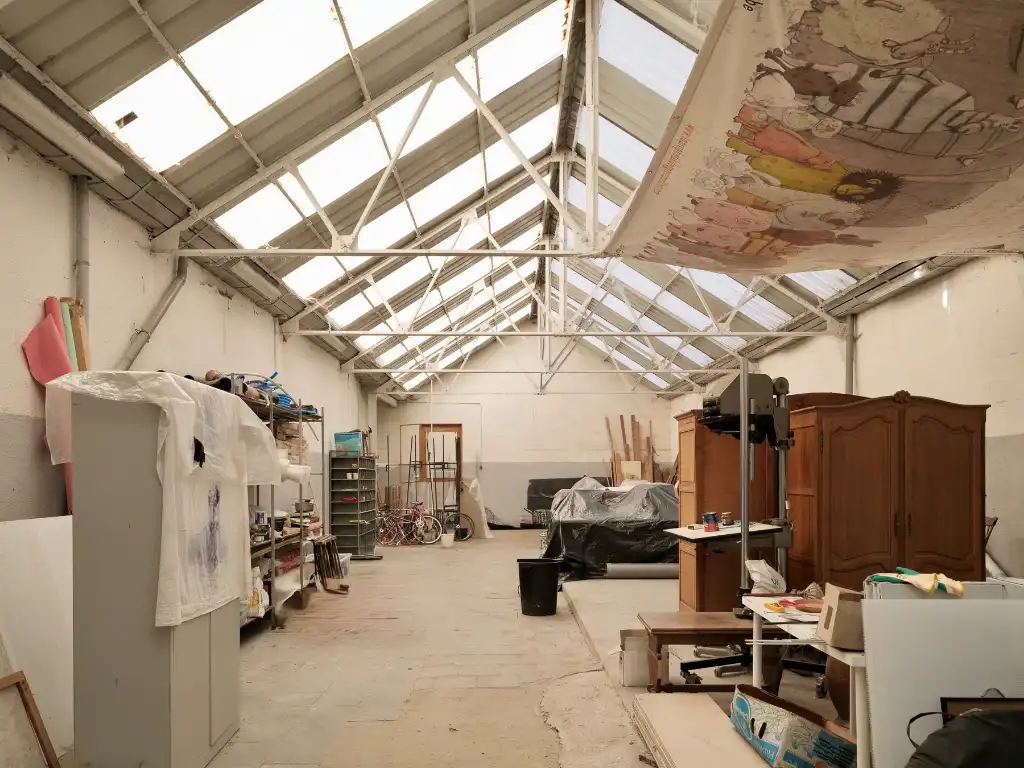 Opbrengsteigendom met magazijn en twee appartementen nabij Gent foto 4