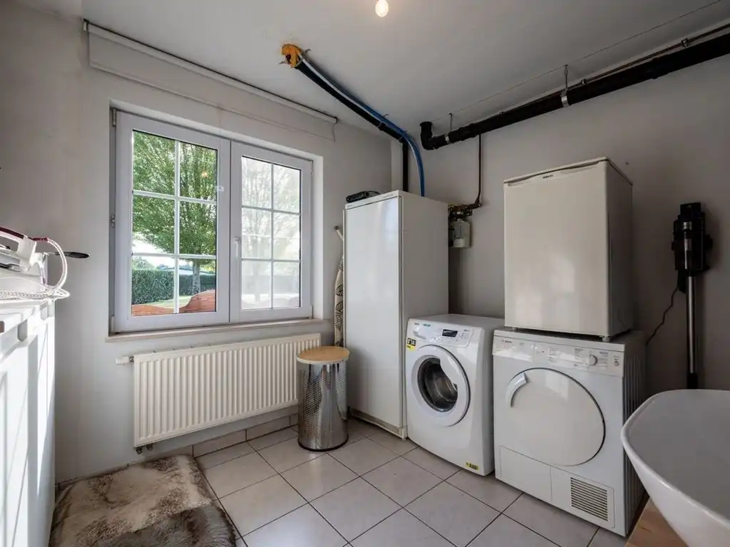 Gezellige, instapklare gezinswoning op riant perceel foto 36