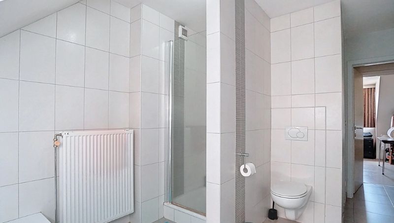 Ruim 3 slaapkamer duplex-appartement van 130m² met terras op zuid-oosten, ondergrondse staanplaats en kelder foto 15