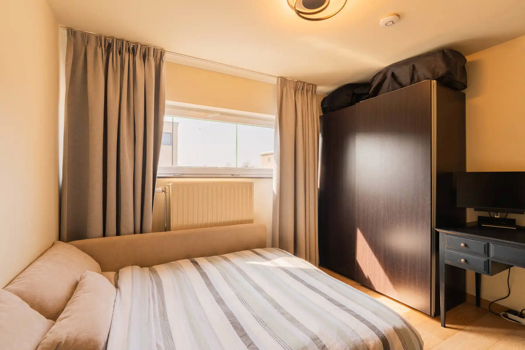 Ruim, energiezuinig appartement met terras, tuin en garage foto 17