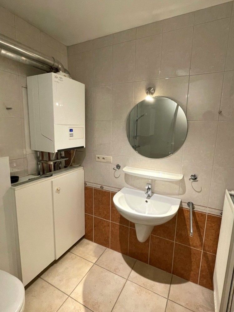 Duplex appartement met 2 kamers en autostaanplaats nabij centrum van Haasrode foto 15