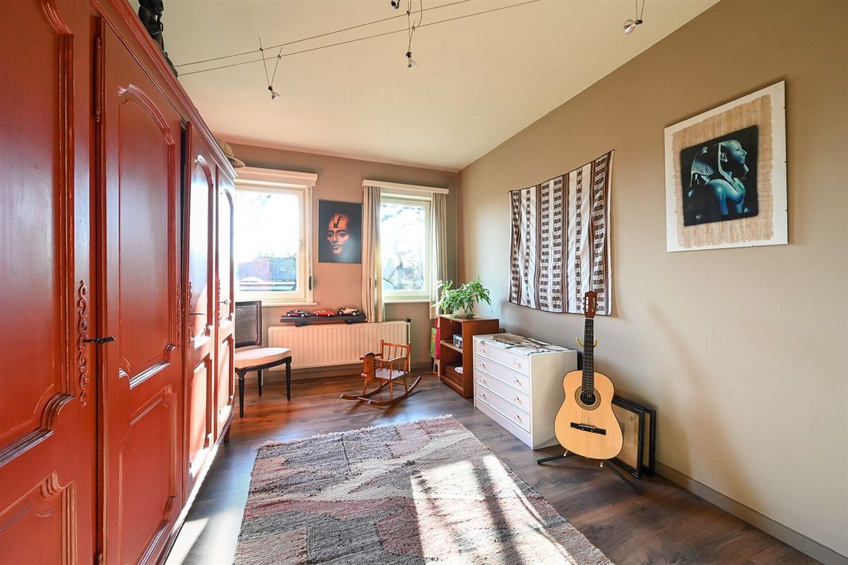 Mooie villa met veel potentieel in de populaire wijk "De Sterre"

 foto 23