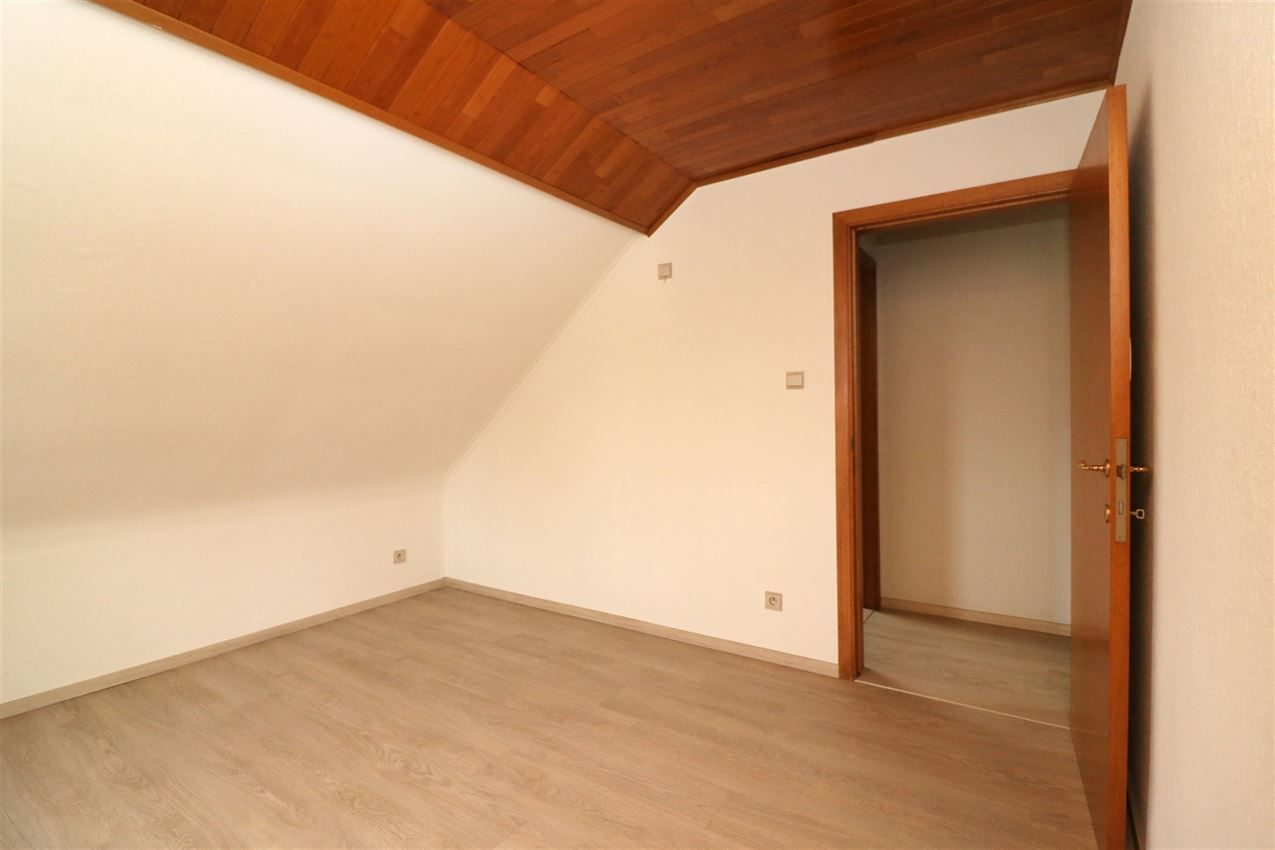 Centraal gelegen appartement met 3 slpk., garage en terras foto 24