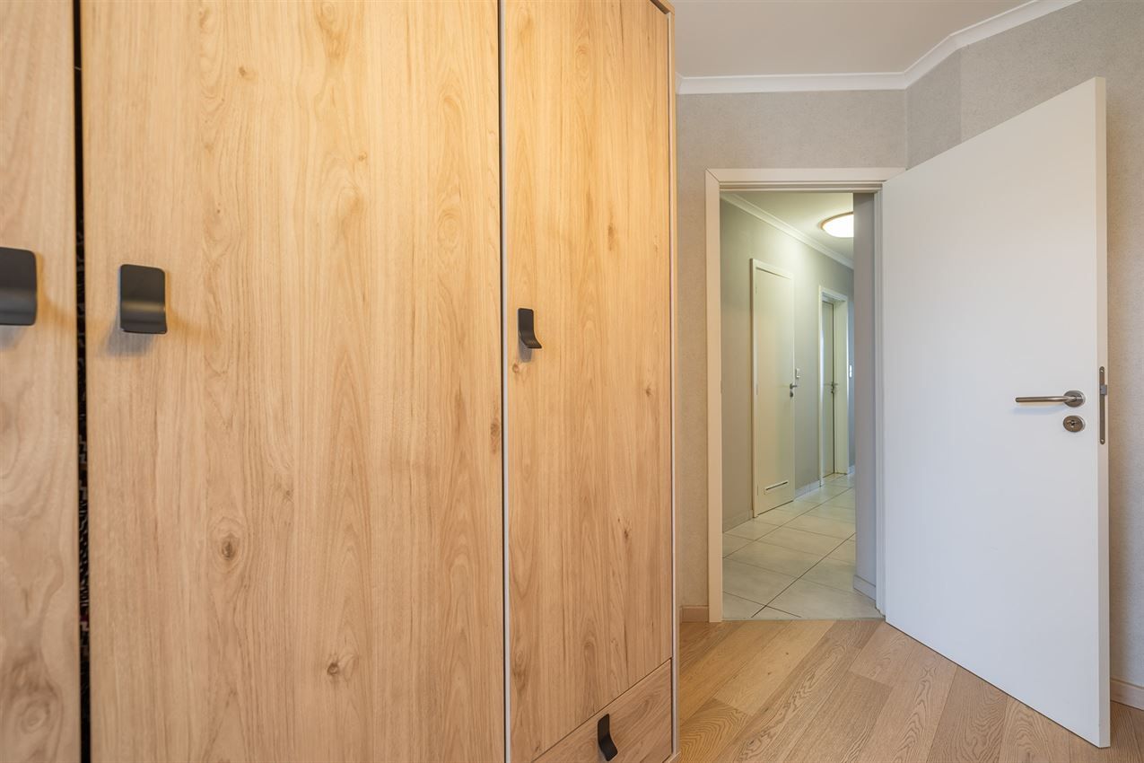 Verzorgd gebouw met handelszaak en 2 apt foto 12