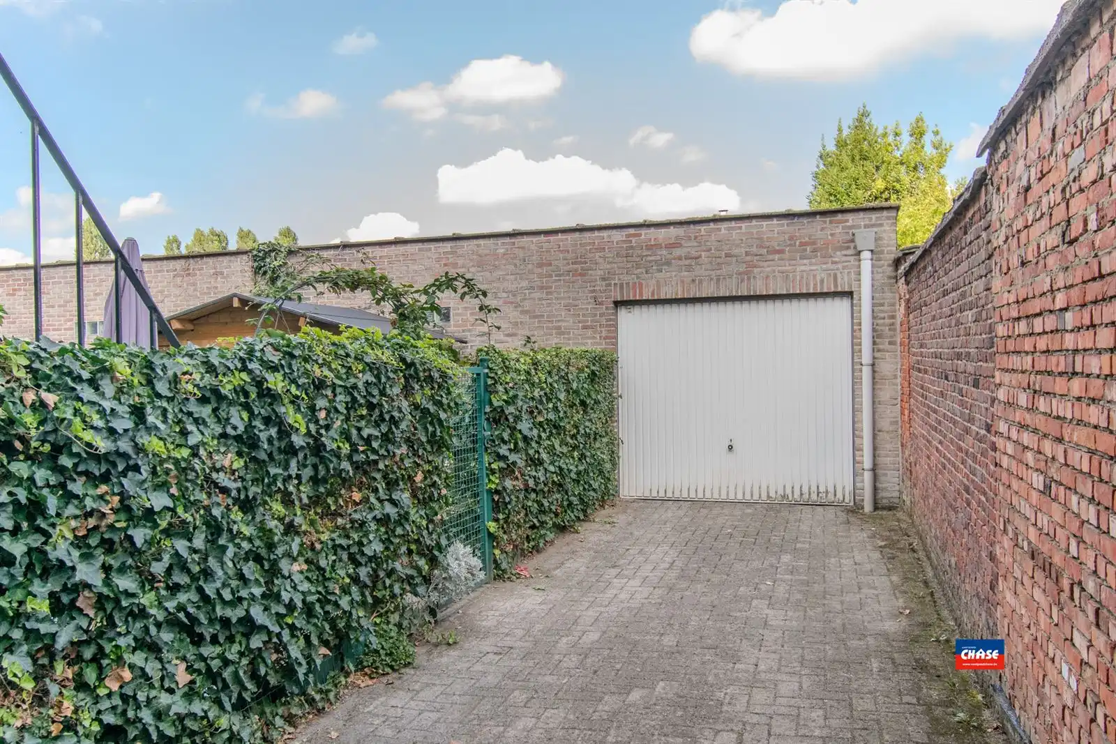 Gelijkvloersappartement met 2 slpks, tuin + garage foto 14