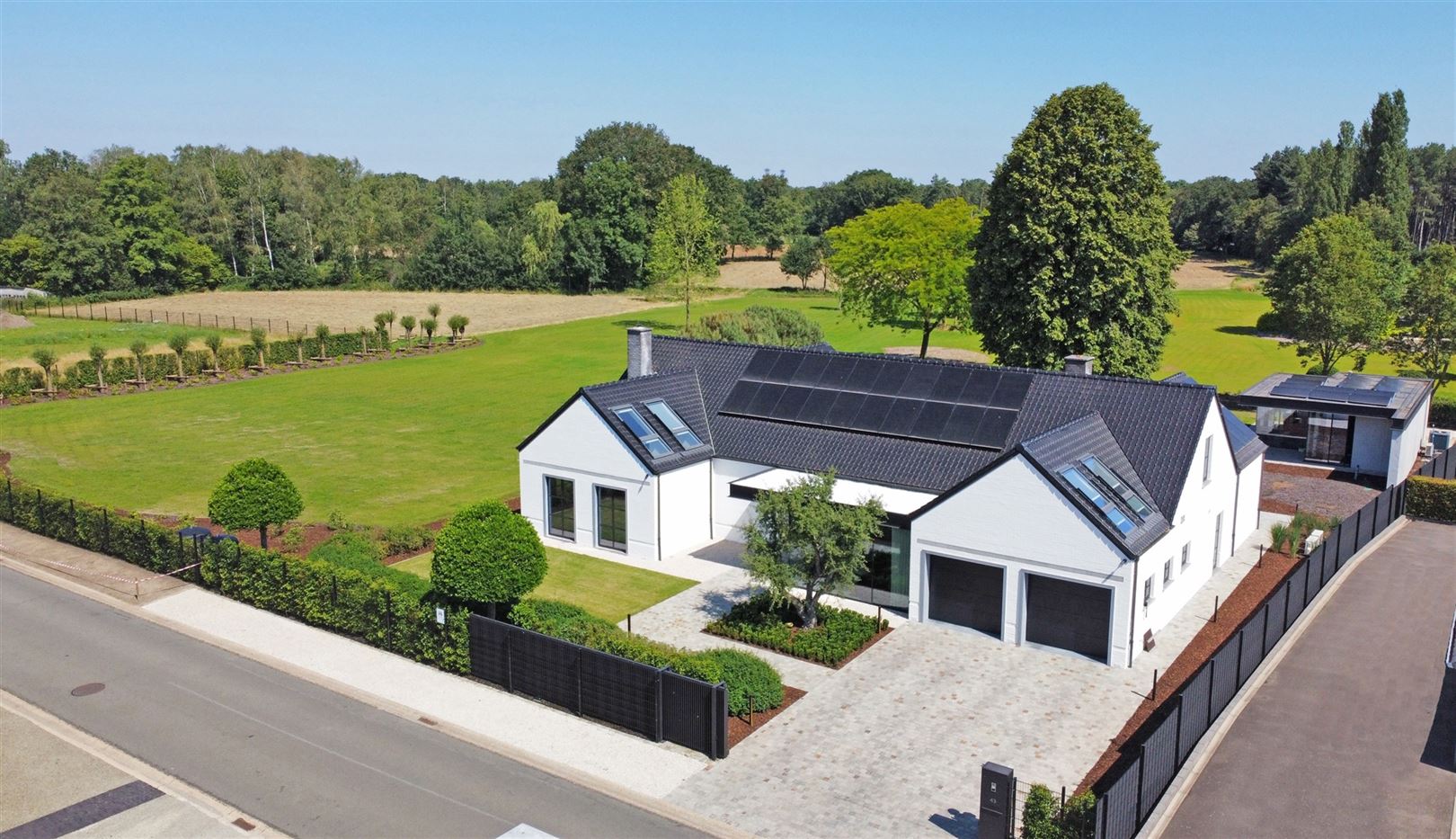 Energiezuinige villa met 3 bouwgronden en prachtig zicht foto 1