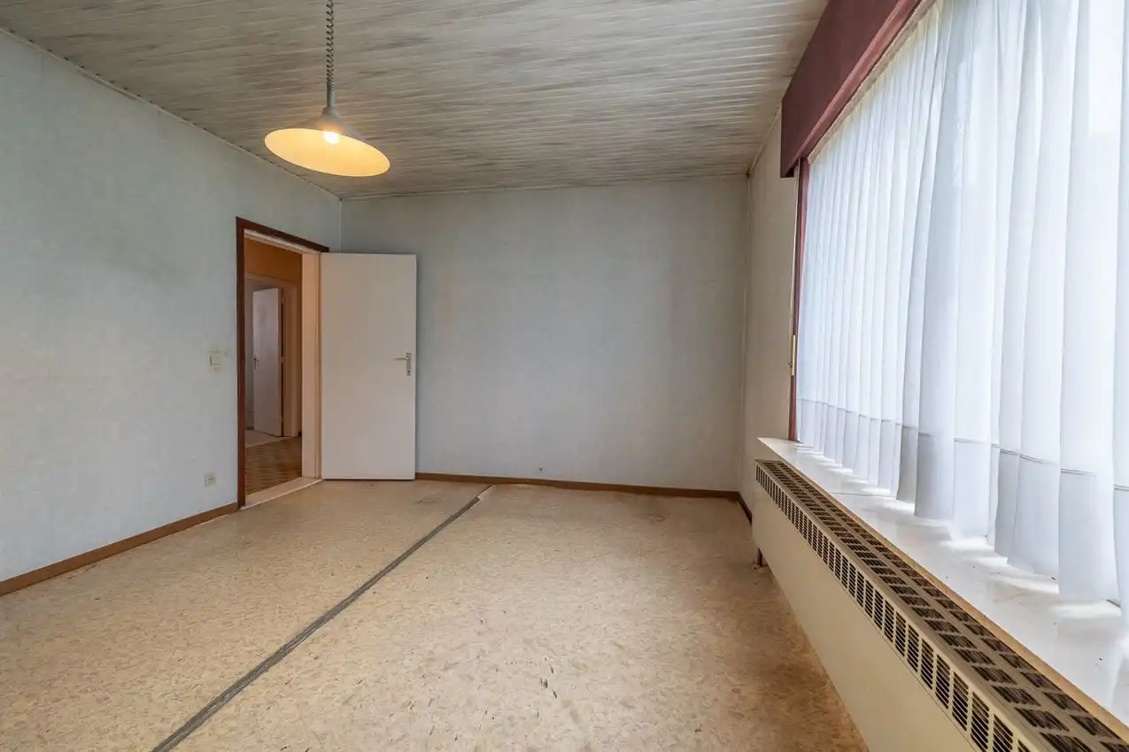 Gelijkvloerse woonst, 3 slpk, op 29a 53ca foto 10