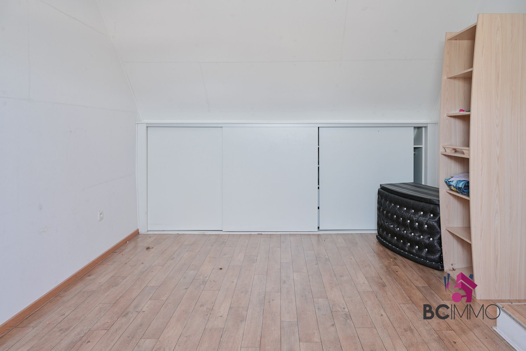 Handelswoonst met een triplex appartement te koop in Genk foto 16