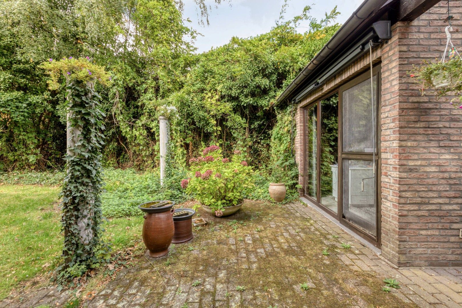 Ruim ingedeelde woning met oa 3 slpks op een gunstige locatie in het centrum foto 29