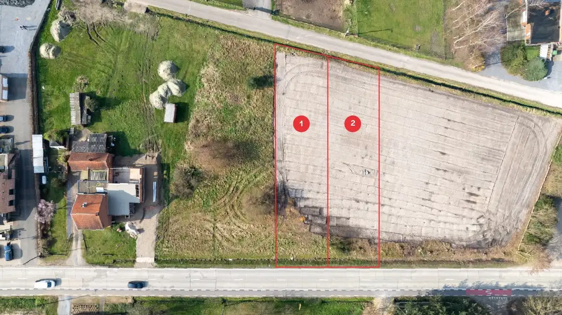 Twee ruime bouwgronden met een ideale oriëntatie foto {{pictureIndex}}