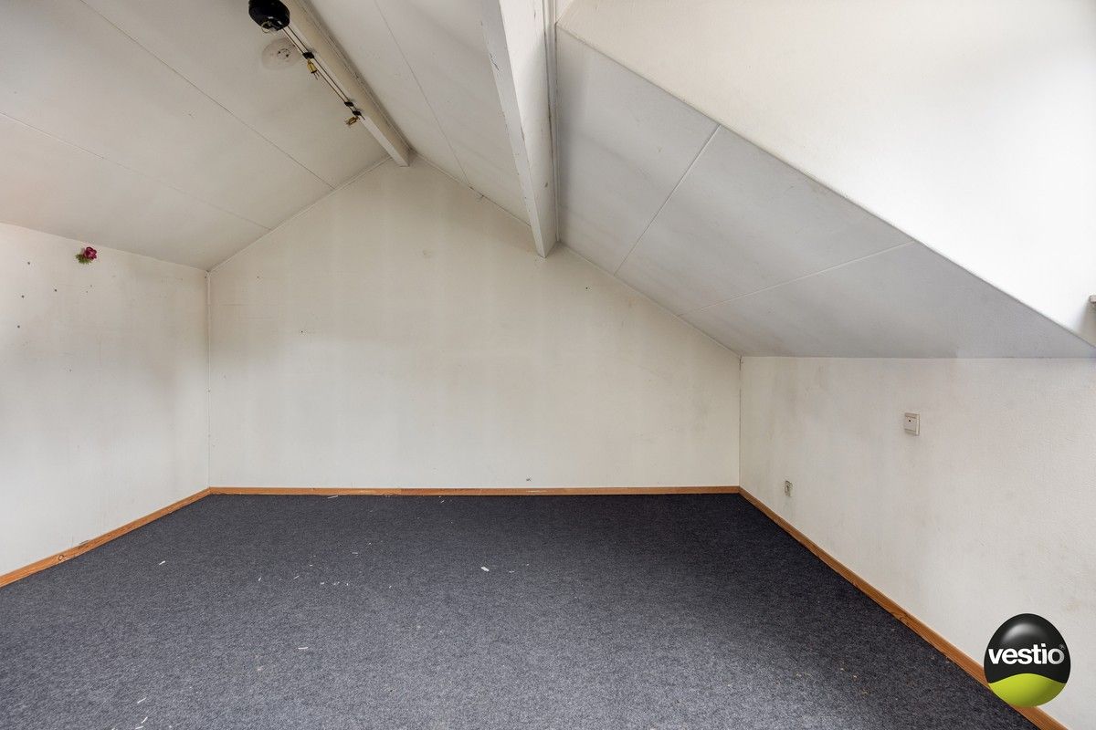 Handelspand met woonst / projectopportuniteit aan de Luikersteenweg. foto 15