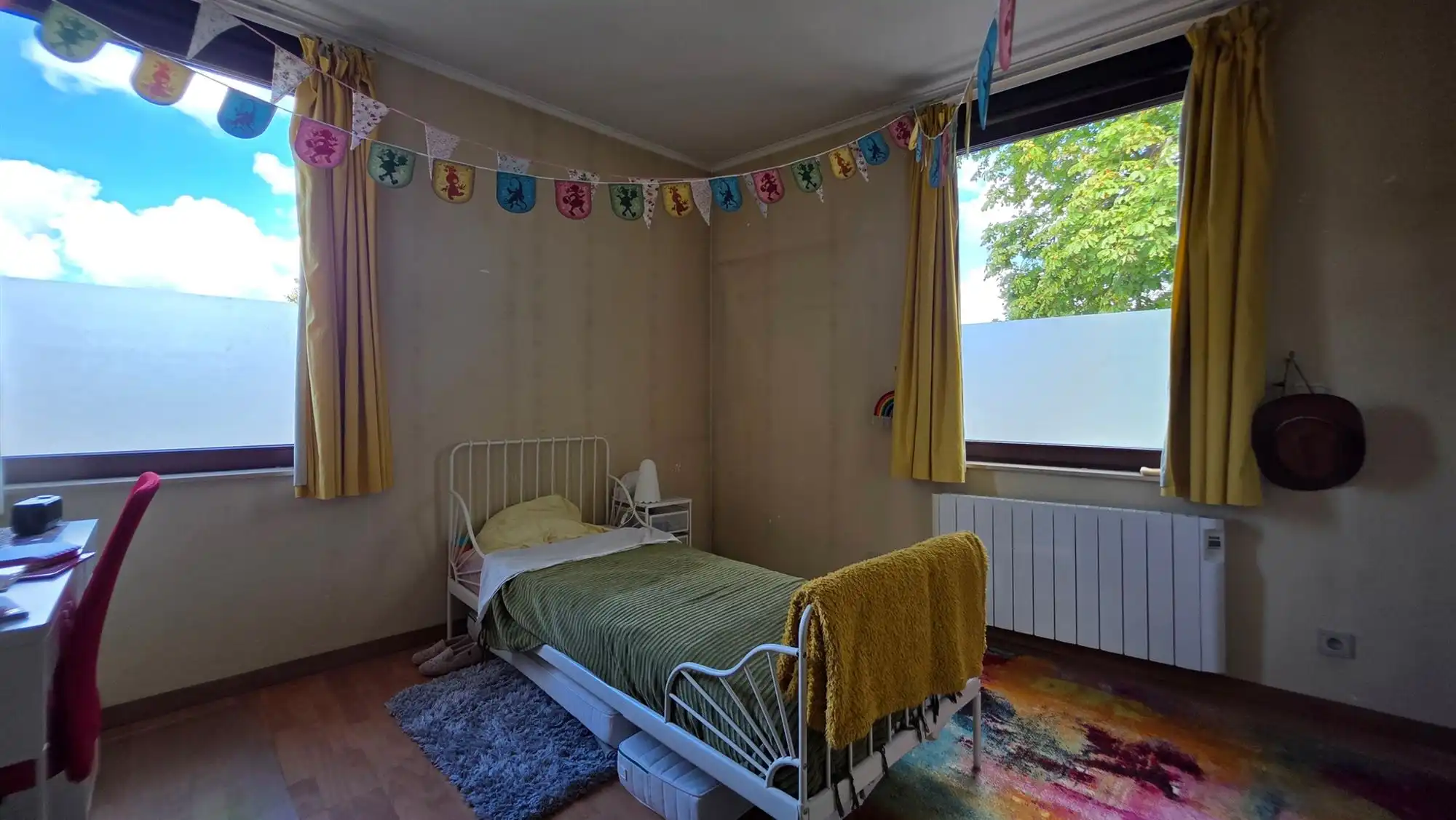 Aangename 3-gevel woning met tuin foto 14