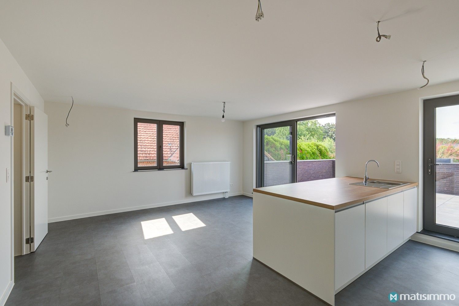 INSTAPKLAAR DUPLEXAPPARTEMENT MET 2 SLAAPKAMERS EN CARPORT IN MOPERTINGEN (BILZEN) foto 7