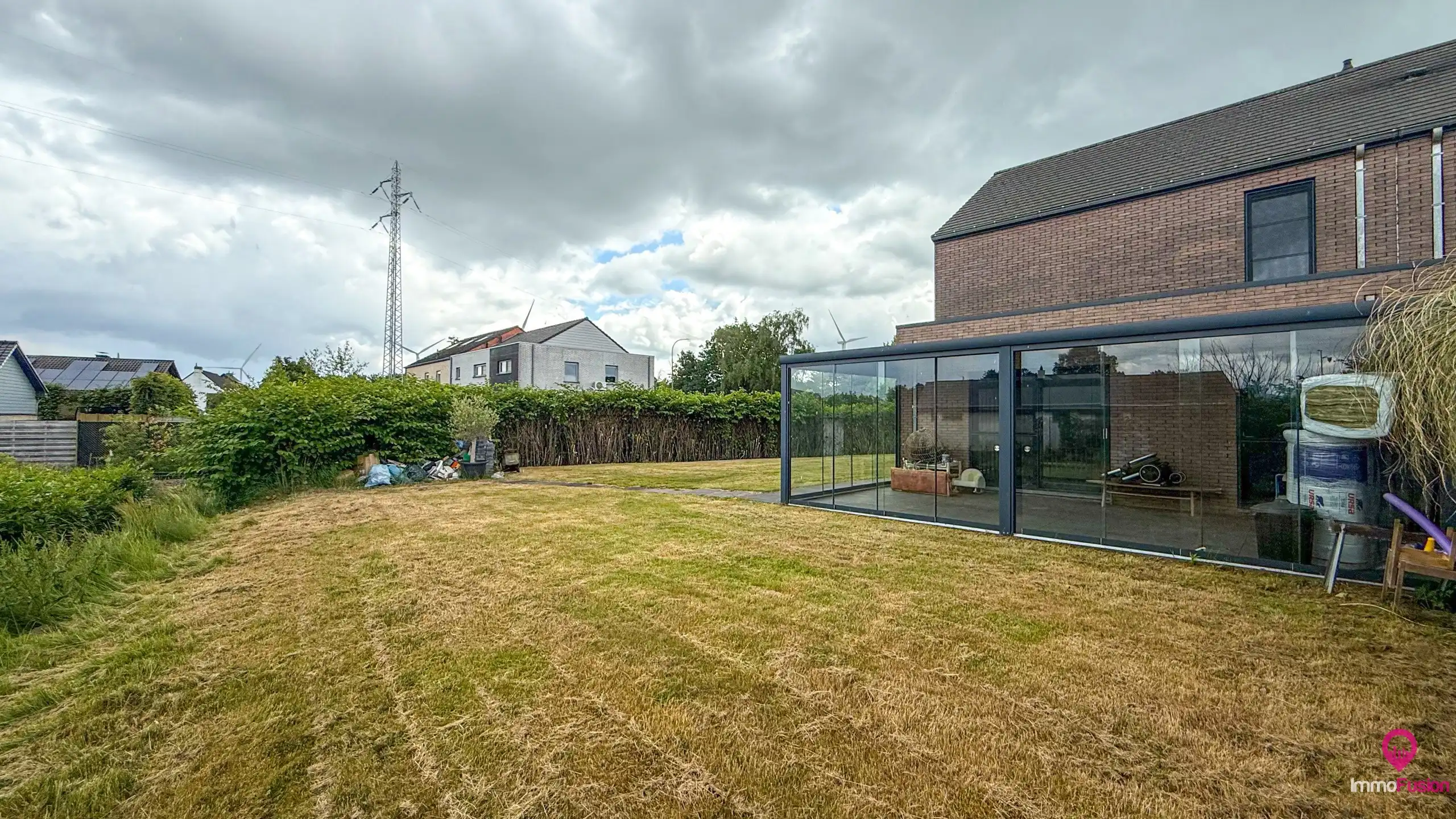 Recente halfopen woning met 3slpks, veranda en ruime tuin! foto 42