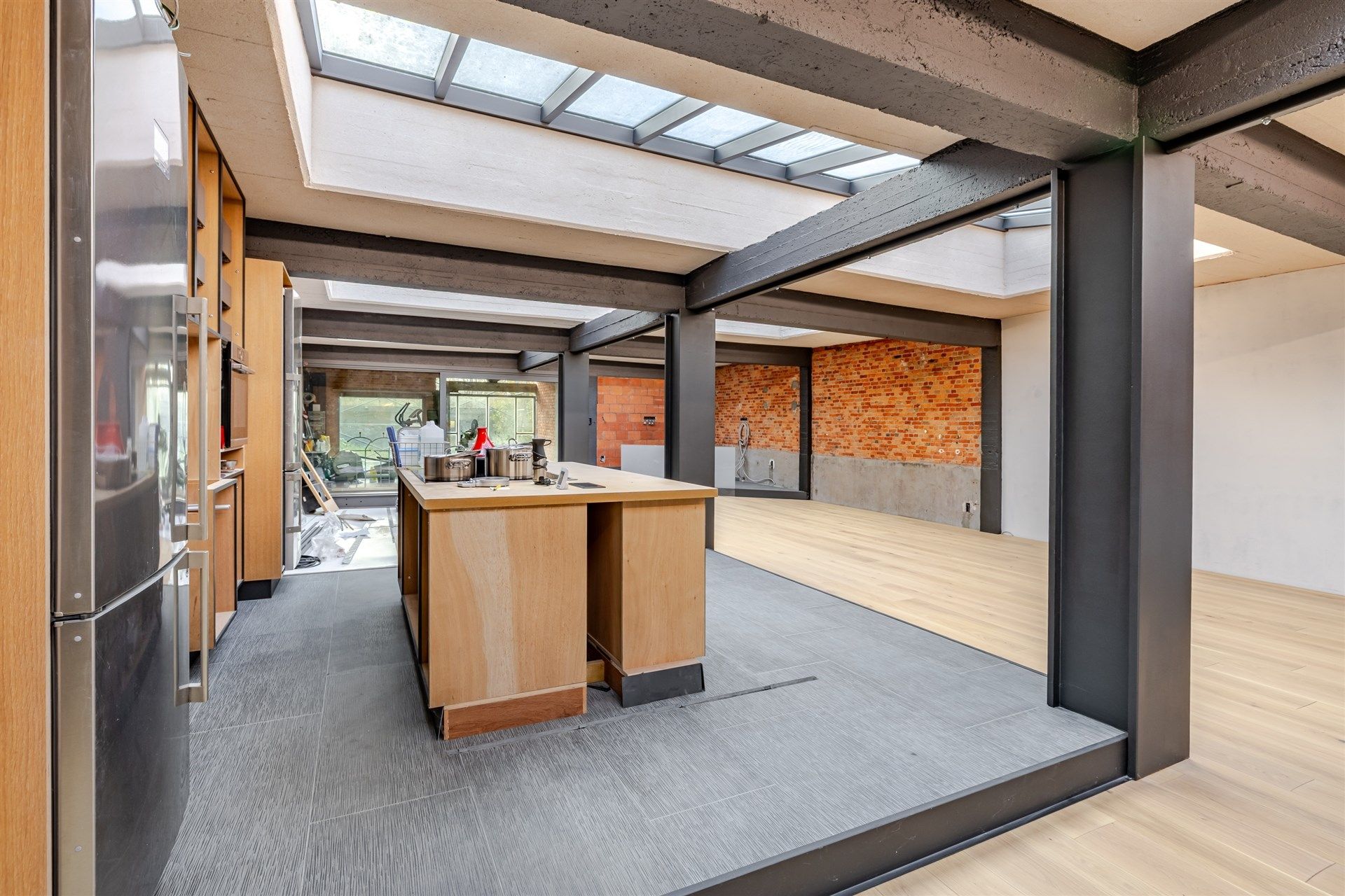 Unieke loft (290m²) met atelier, studio, tuin én magazijn (200m²) foto 4