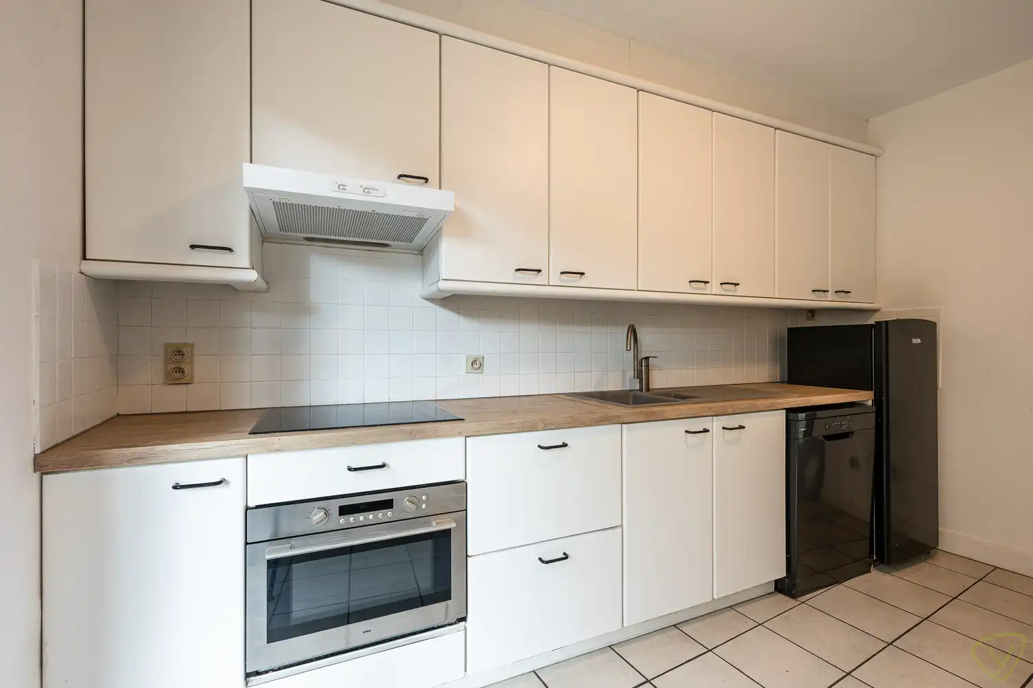 Ruim gelijkvloersappartement met private garage in de Kaaistraat! foto 7