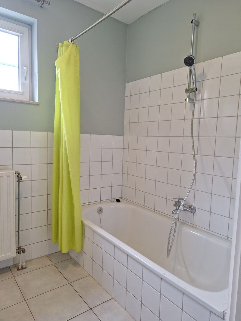 Stijlvol gelijkvloers appartement met terras en autostandplaats foto 13